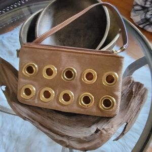 COACH Suede wrislet with grommets